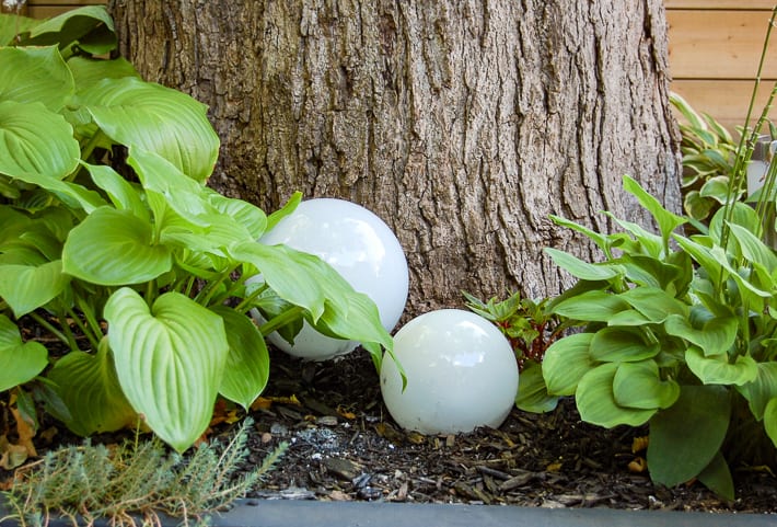 Glowing outdoor orbs in daytime.