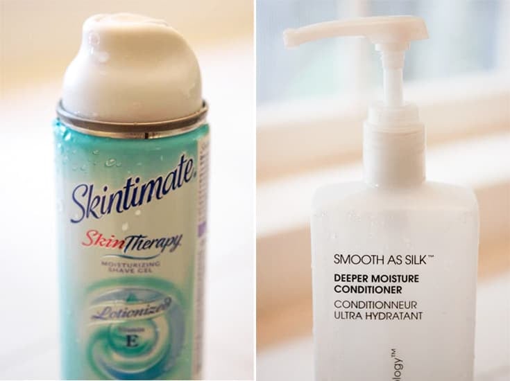 Can of shaving cream beside bottle of hair conditioner.