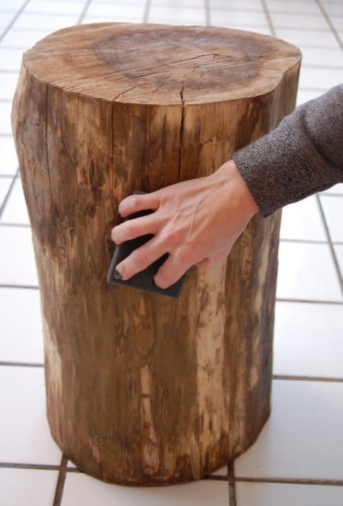 Sanding block being used on trunk table.