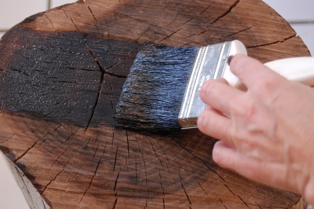 Brushing finish onto open end of wood