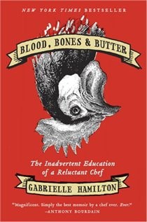 Blood, Bones & butter book with red cover and an upside down chickens head on it.
