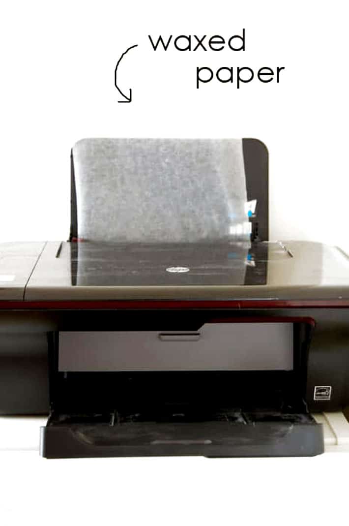 Inkjet printer with wax paper fed into it.