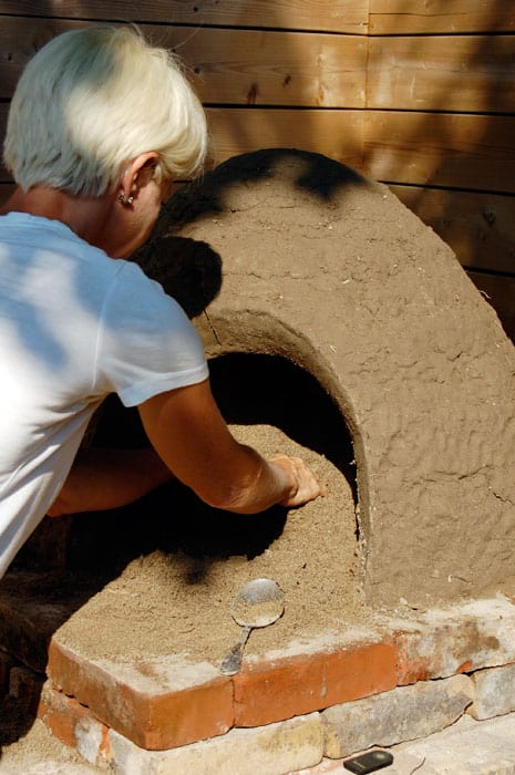 digging-out-sand-cob-oven