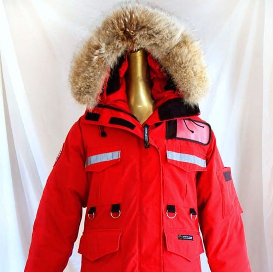 Red Canada Goose Resolute parka with fur trimmed hood.