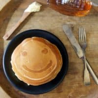 Smiley face emoji pancake.