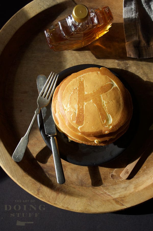 Pancake art with "K" initial.