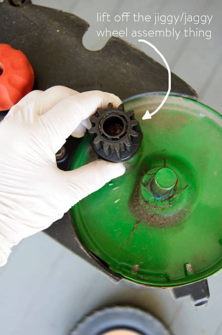 Removal of wheel cog on reel mower.