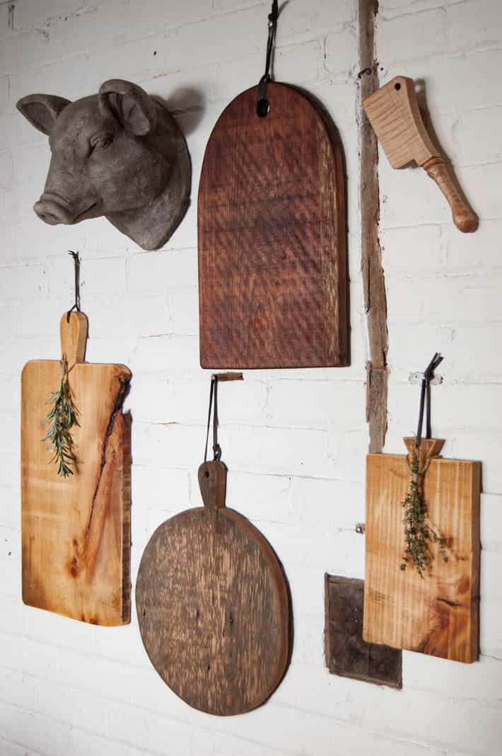 Make your own "antique" wood serving board in about 2 hours. DIY charcuterie boards hang on wall.