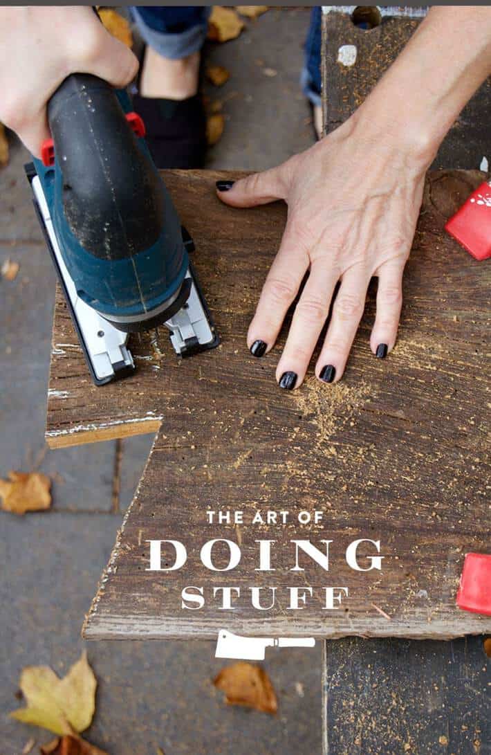 Cutting wood into a cheese serving board with a Bosch jigsaw.