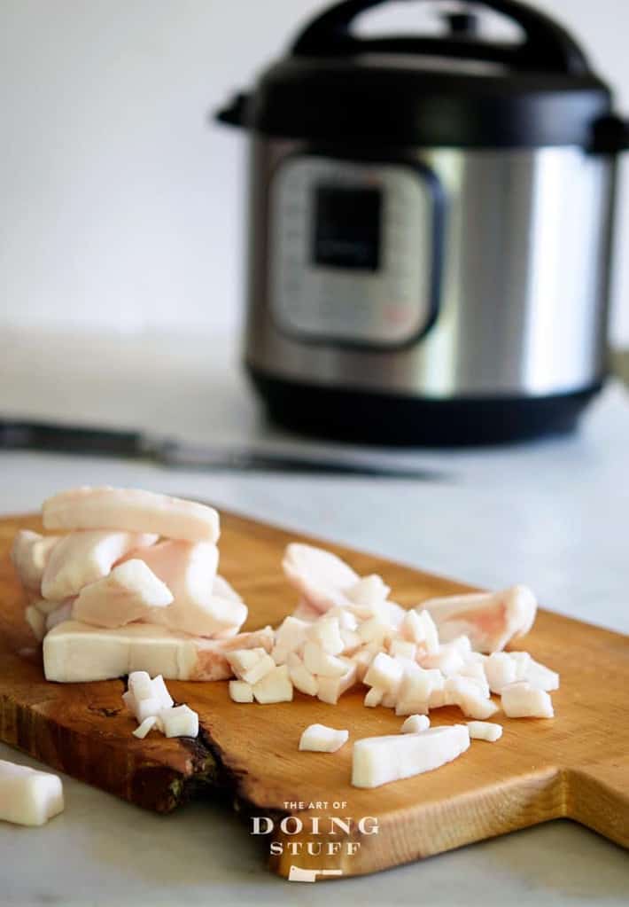 Pork fat being prepared to render into lard.