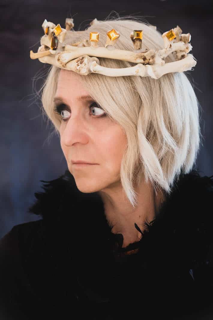 Karen Bertelsen wearing crown of bones.