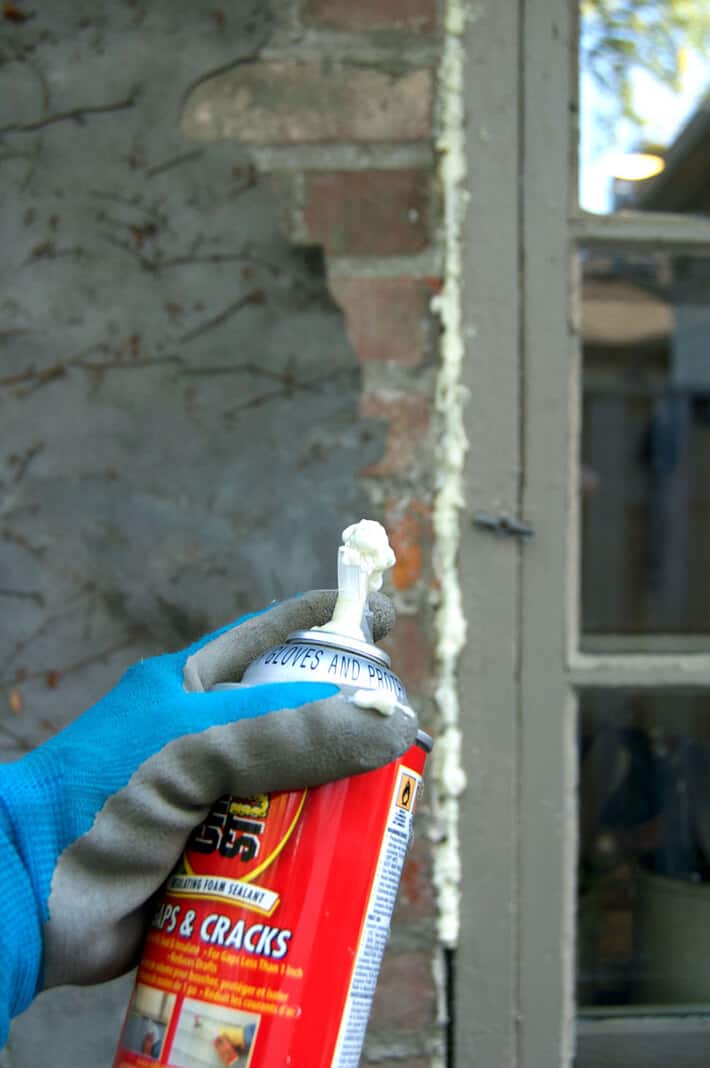 Great stuff foam sprayed over hardware cloth in house crack between bricks and window.