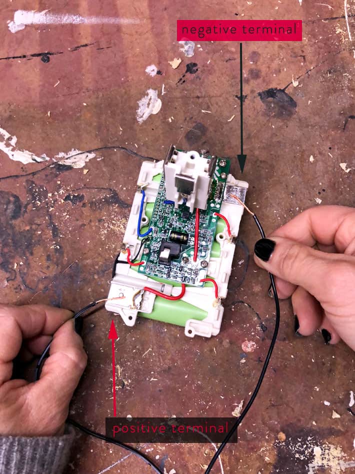 Boosting an 18 volt battery with an AC adapater.