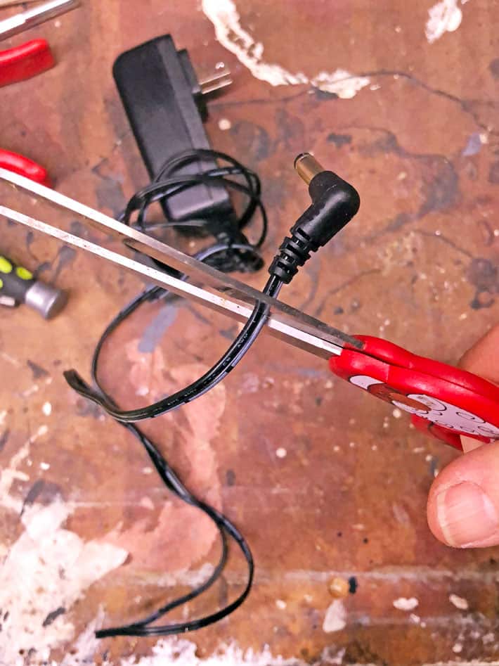 How to fix a new 18V battery that won't recharge. Cutting the end plug off of an AC adapter.