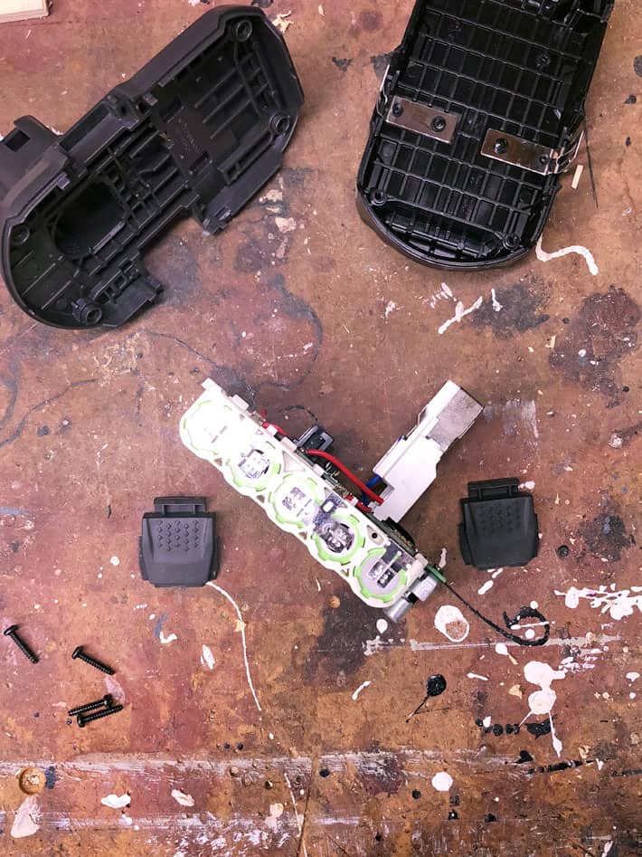 How to fix a new 18V battery that won't recharge. Ryobi battery completely disassembled on workbench with charging cells removed.