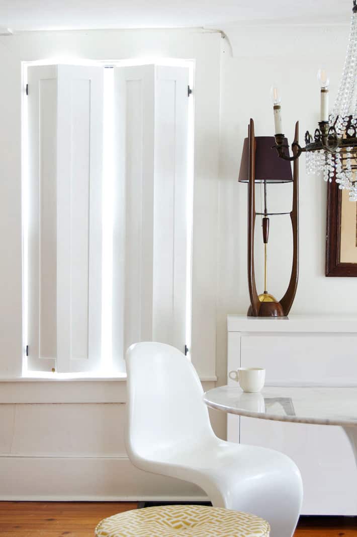 Clean looking shaker style interior shutters in elegant historic home.