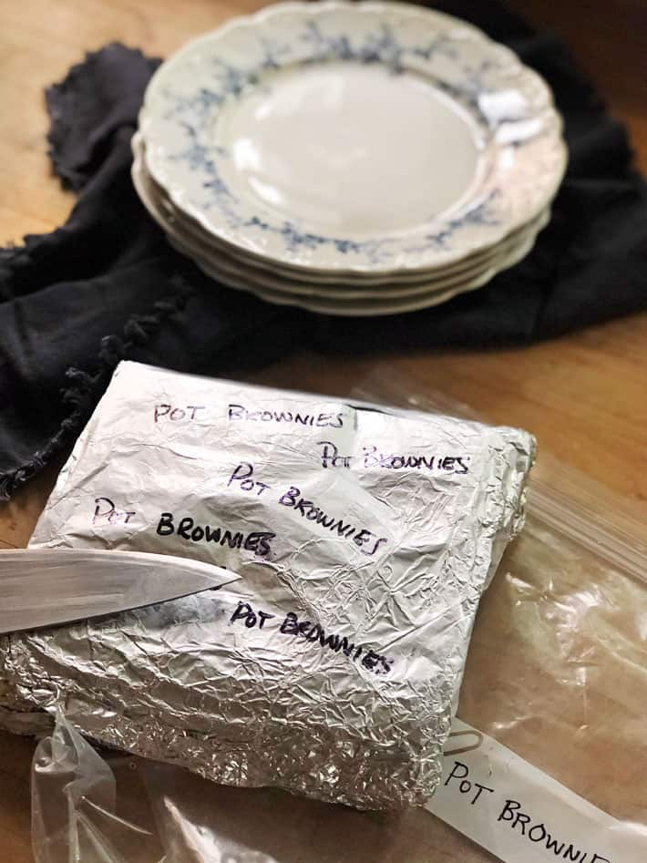 Pot brownies wrapped in a double layer of foil and a plastic bag for well identified freezer storage.