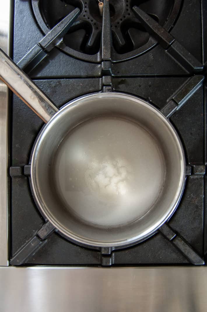Water, sugar and cream of tartar in a pot prior to boiling for spun sugar.