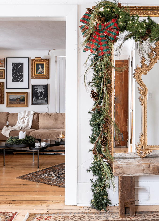 Living room and mirror decorated for Christmas