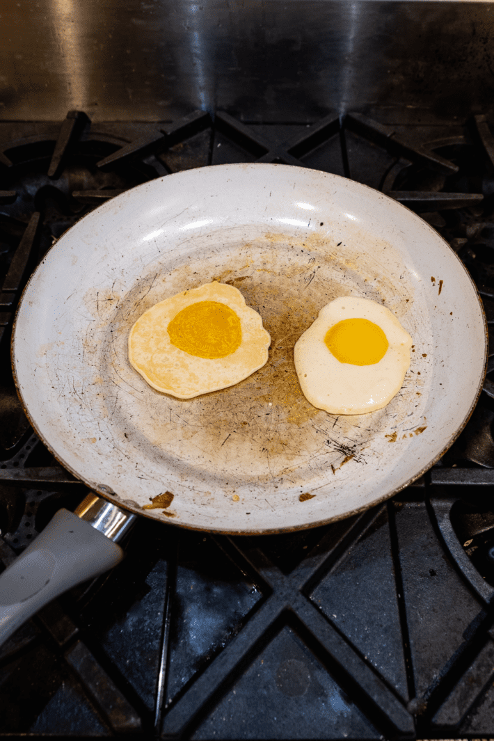 Fried egg pancakes in a non stick pan.