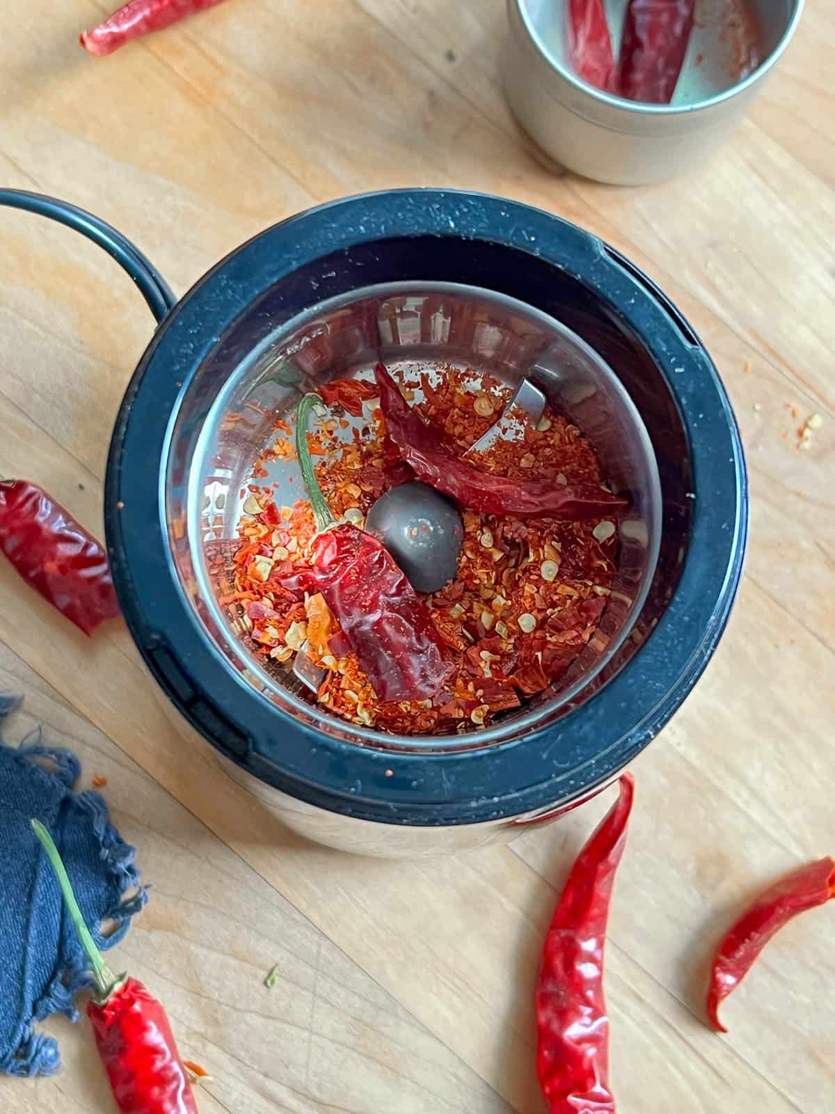 Red pepper flakes in a spice grinder.