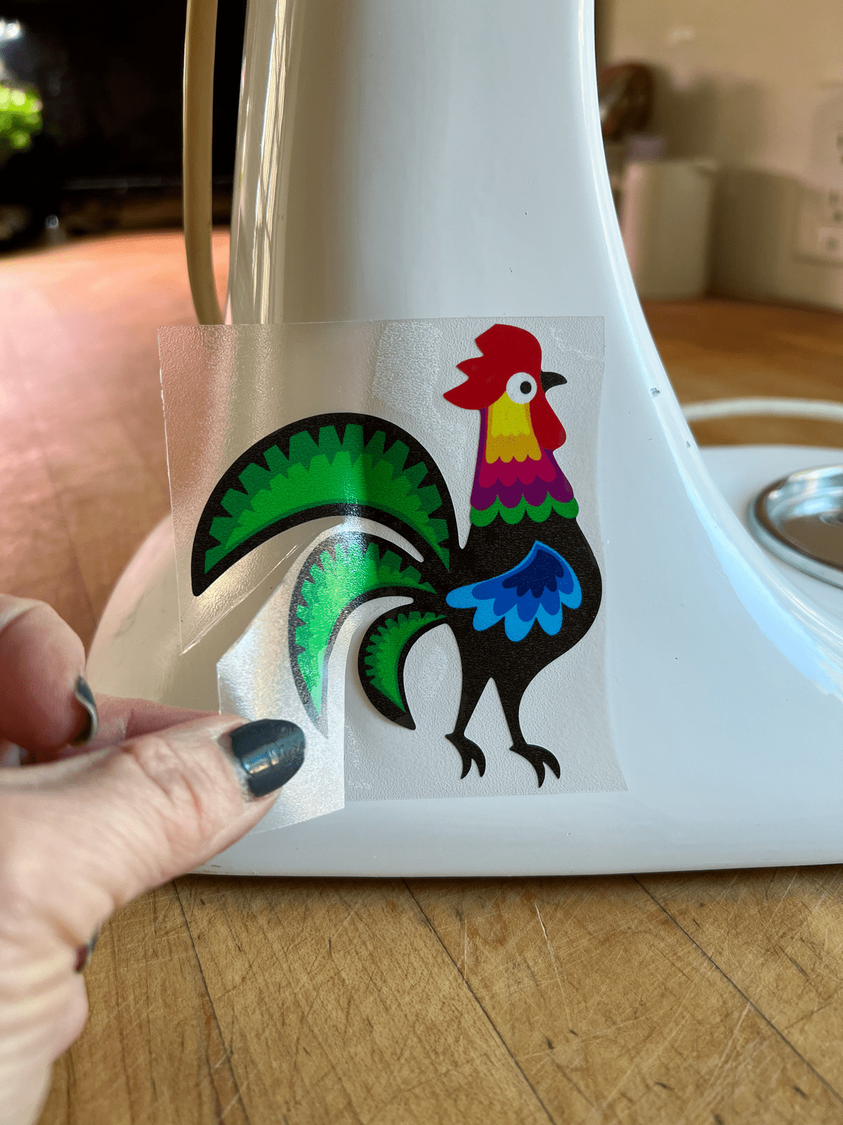 Vinyl rooster decal on stand mixer.