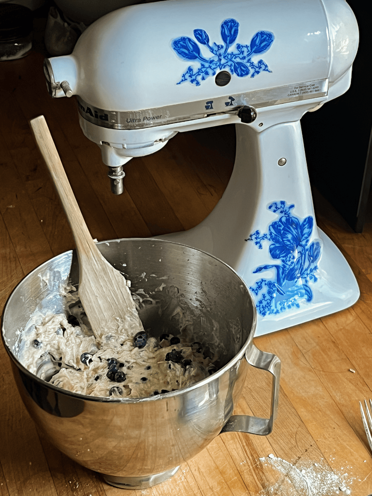 Blueberry banana bread batter mixed in stand mixer.