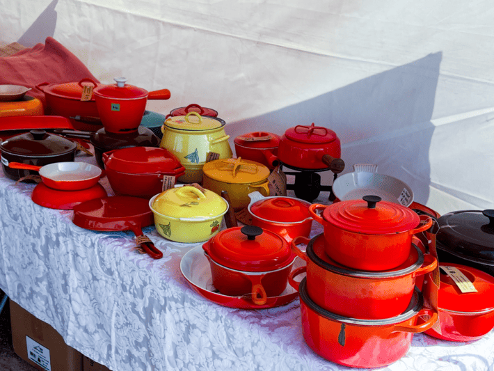 Vintage bright red, orange and yellow cast iron enamelware. 