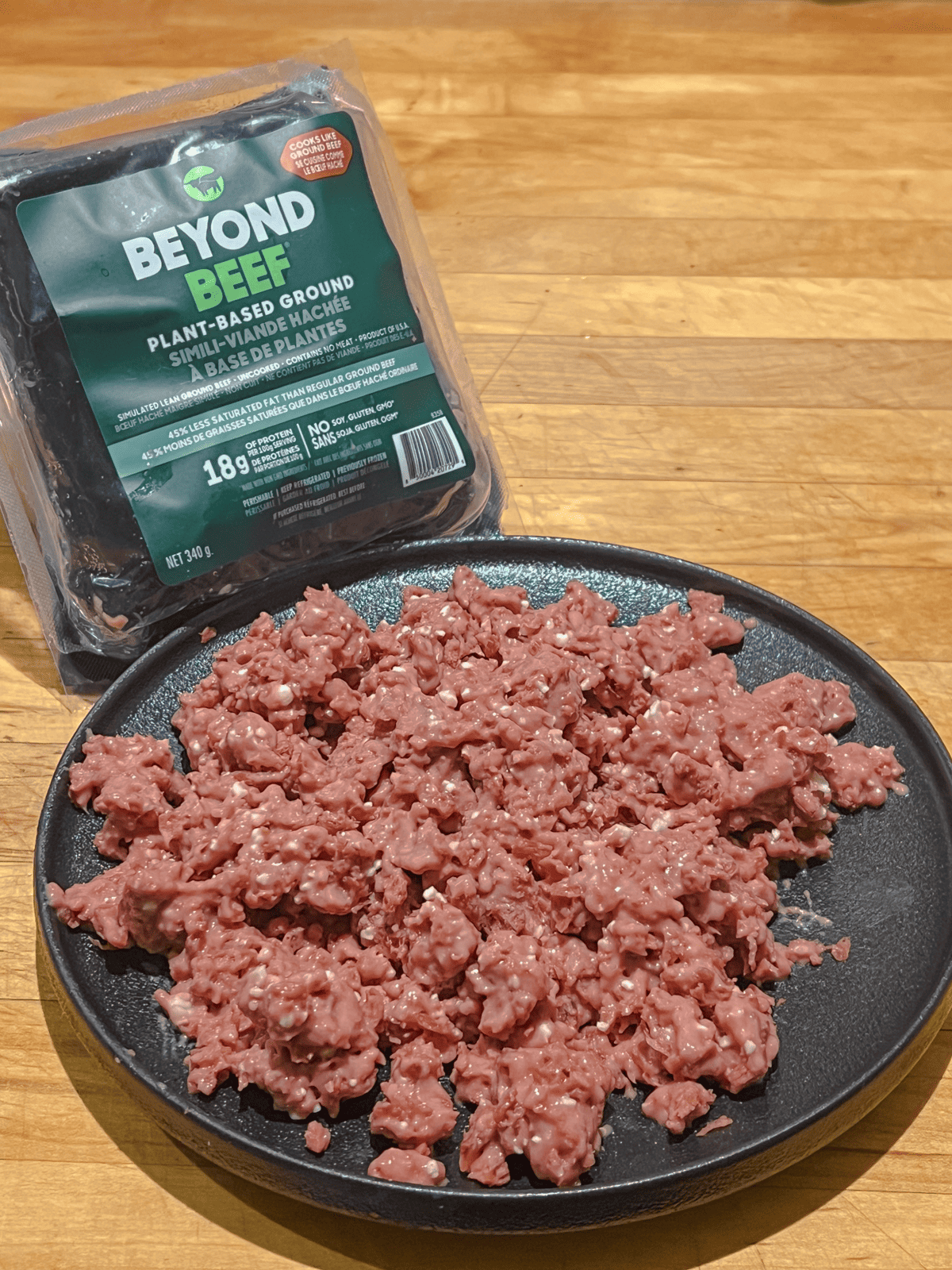 Beyond Beef package and contents on a black plate.