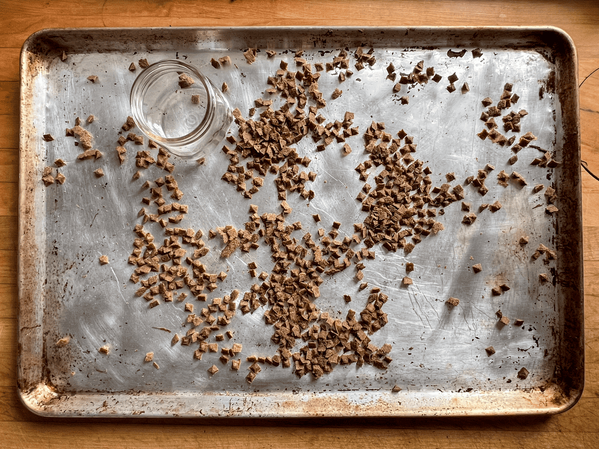 Soft baked dog treats on baking sheet.