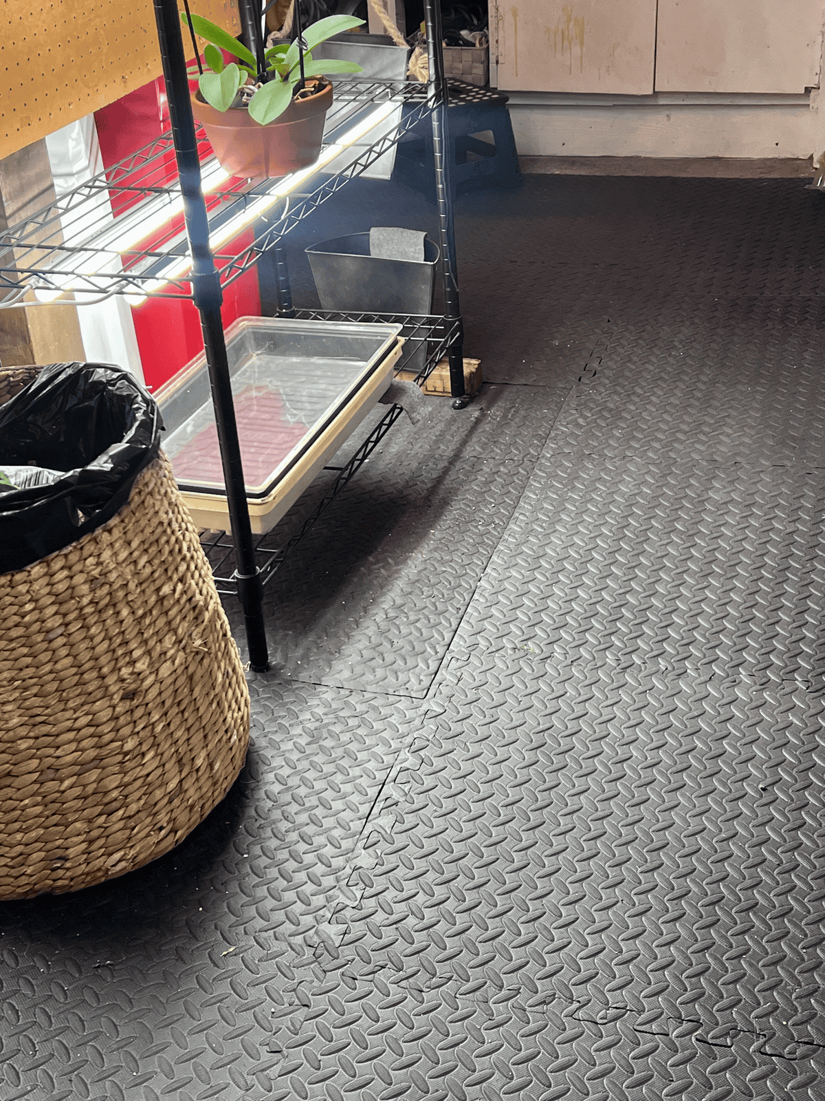 Rubber gum mats on basement floor.