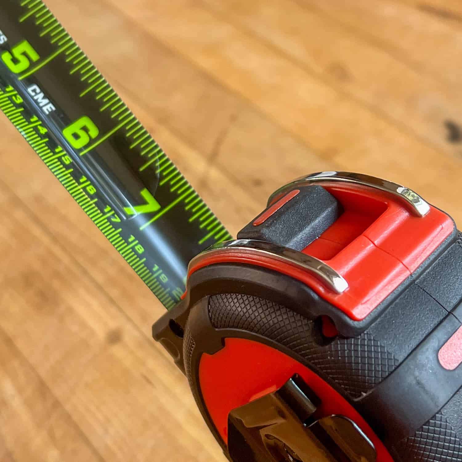 New Lufkin 26' tape measure with black and green tape pulled out.