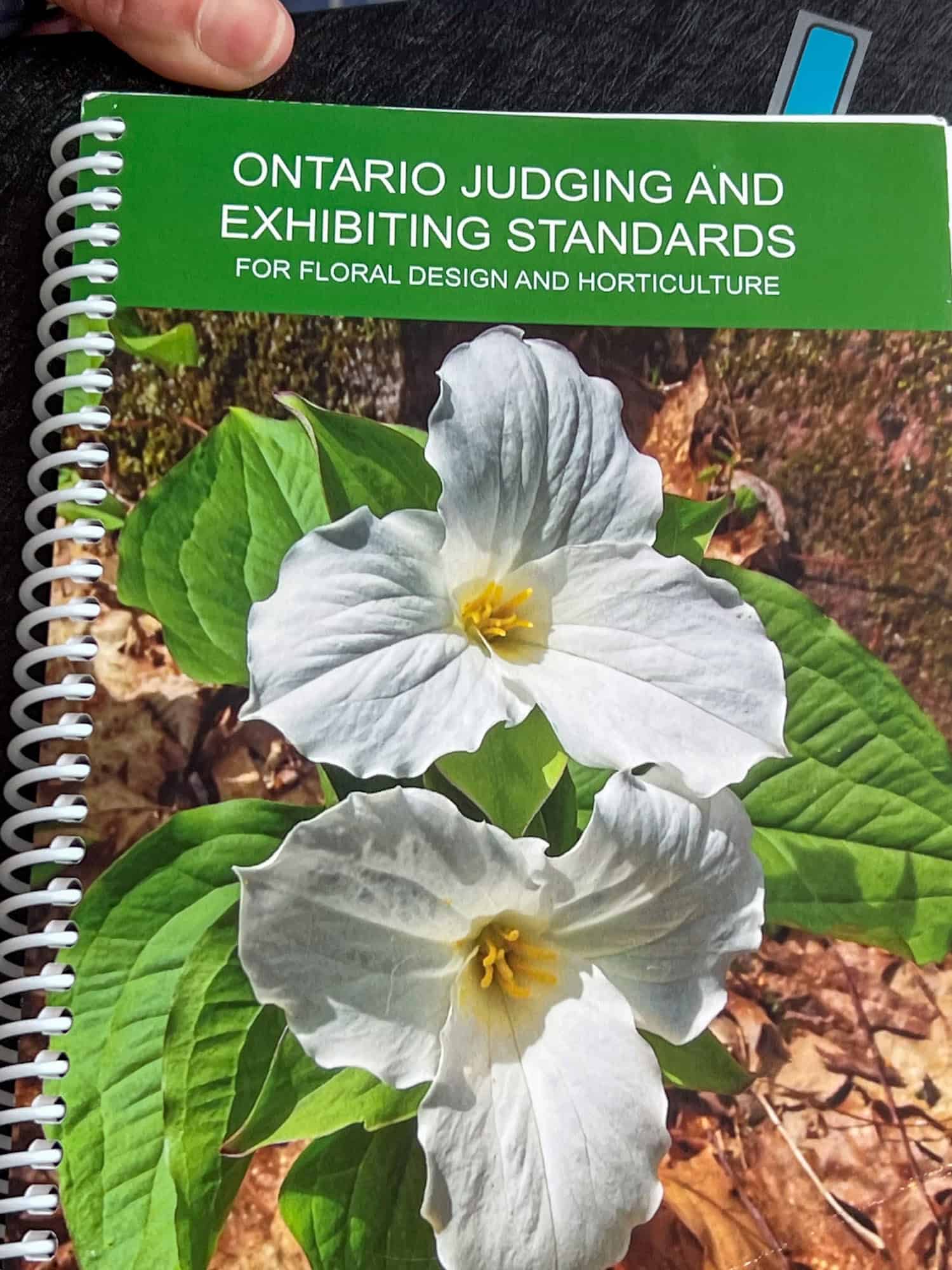 The Ontario Judging and Exhibiting Standards for Floral Design and Horticulture booklet.